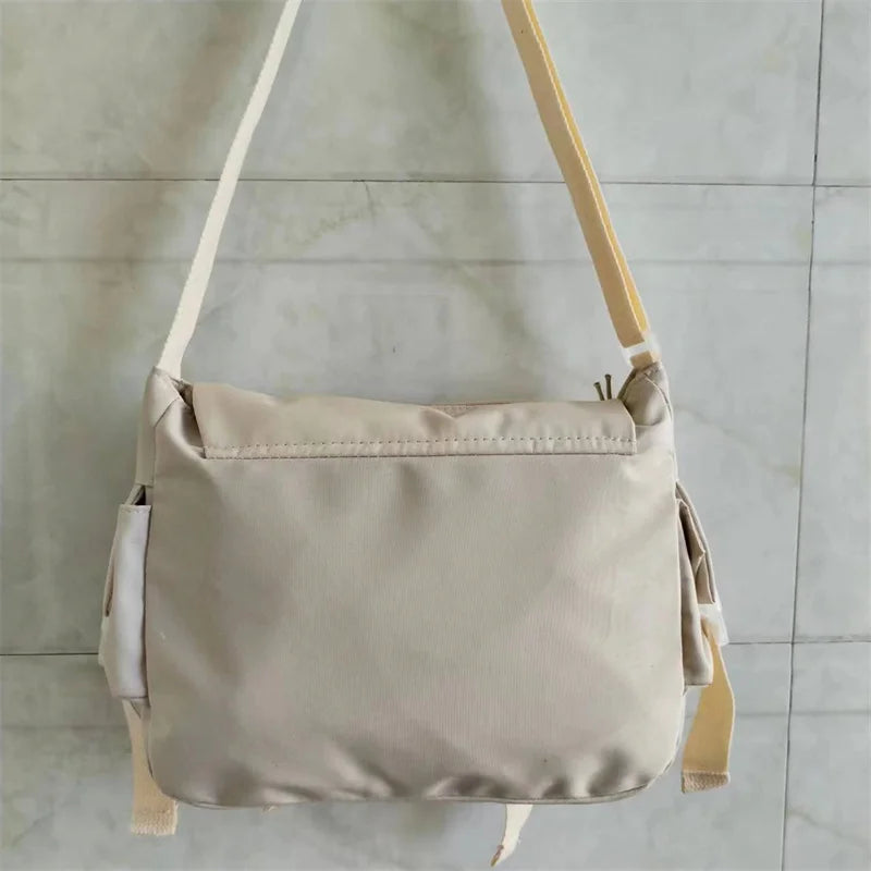 Large capacity student class crossbody canvas bag, women's versatile new Japanese Harajuku solid color mailman shoulder tote bag